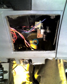 This zoomed-out shot gives a better idea where this crack is, and the size of the spider (actually pretty small).  The failed instrument light 'Remote Dimmer' is visible here too.