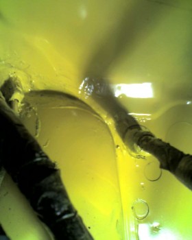 I let the sealant cure over the weekend, and topped it off with Rustoleum's &quot;7747 Sunburst Yellow&quot;,which is darn near a perfect color-match for the car.