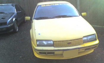 Far from done, the car is at least presentable now.  With a new hood, some paint, and some buffing, she'll look good from ten feet away.