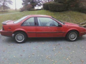 Door and mirror got slightly crunched.<br />As you can see the gas cap door is unhinged.