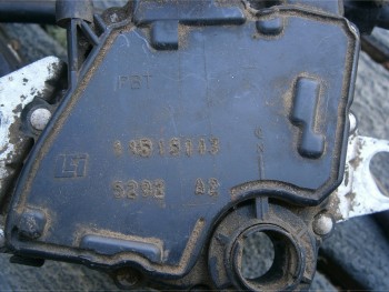 Above the "PBT" is a small scratch -it is NOT a crack...