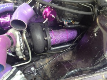 T-04 & Wrapped DP1a.jpg (138.91 KiB) Viewed 7558 times The clutch hydraulic hard-line looks closer to the turbo in this shot than it is. The other side by the cold-section is actually closer.