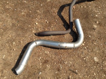 Exhaust Old vs New 2a.jpg (271.54 KiB) Viewed 7444 times Out with the old, and in with the new! Not always a fan of that attitude, but c'mon, how restrictive would the original pipe be?? It can be seen that I redesigned the bend-angles a little, I like how this one clears everything underneath.