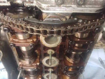 Riddle me this, Batman... If VAG can utilize a CHAIN to drive the Intake Cam off of the Exhaust Cam, why the !@$#! don't they use a frigging CHAIN to drive the Exhaust Cam in the first place to avoid breakdowns and repairs like this?  GM did with the Quad-Four and 2.4L Twin Cam engines, just saying...&gt;:(